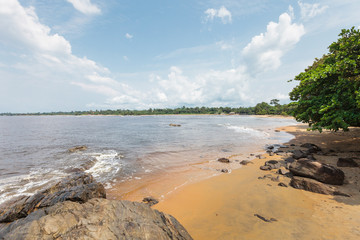 Cameroon, South Region, Ocean Department, Kribi, sandy beach and palm trees by the sea