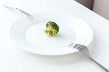 Body Care. Broccoli meal isolated on kitchen table close-up