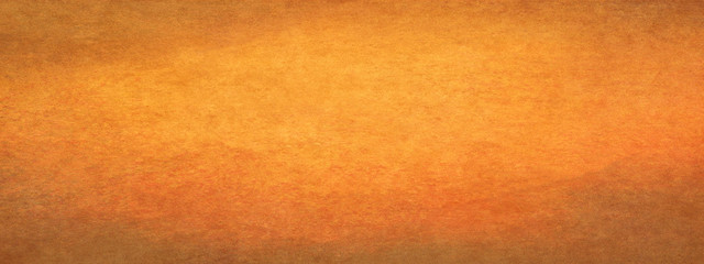 Orange old abstract grunge background.Long panoramic format.