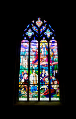 a detailed view of a stained glass window in the Basilica de Saint Malo Church in Dinan in Brittany