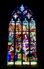 a detailed view of a stained glass window in the Basilica de Saint Malo Church in Dinan in Brittany