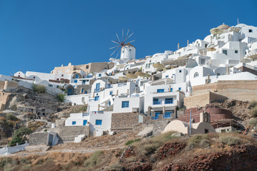 Fototapeta na wymiar Typical Greek Island hillsides of whitwashed buildings