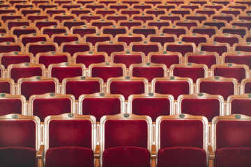 Naklejka premium Row of red seats in theatre