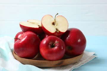 ripe juicy red apples on the table.