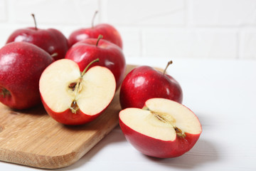 ripe juicy red apples on the table.