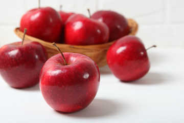 ripe juicy red apples on the table.