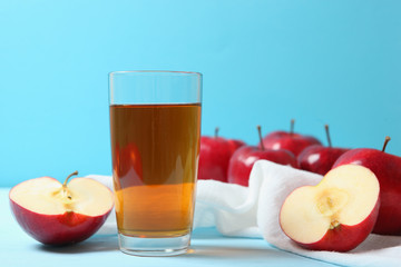 apple juice from red apples on the table.