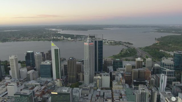 Aerial sunrise view Perth city skyscrapers Swan River
