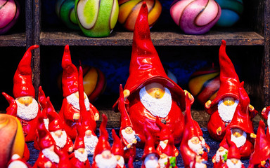 Ceramic Christmas gnome decorations in Christmas market Germany Europe in winter. German Night...