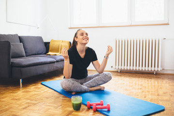 woman training yoga or fitness at her home