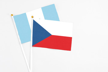 Czech Republic and Guatemala stick flags on white background. High quality fabric, miniature national flag. Peaceful global concept.White floor for copy space.