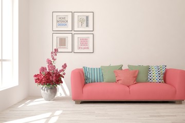 Stylish room in white color with coral sofa. Scandinavian interior design. 3D illustration