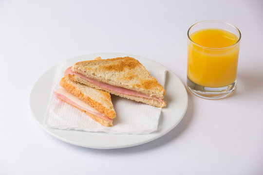sandwich mixto con zumo de naranja