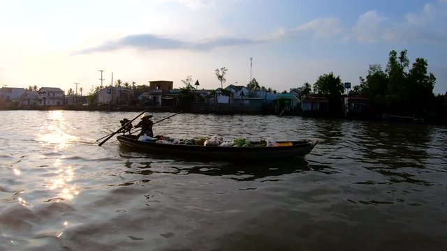 Sunrise trader cruising the Mekong river Vietnam Asia