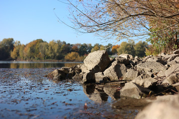 Rocks on the shore of the lake Uetelsheimer See in Germany