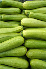 Fresh zucchini as background. Healthy food