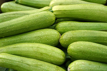 fresh zucchini for sale at farmers market