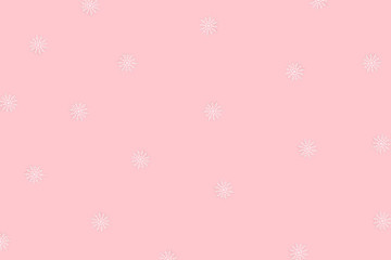 Winter pattern made of snowflakes and on pink background. Christmas concept. Flat lay.