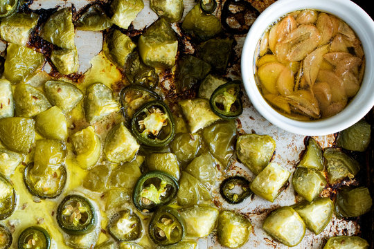 Overhead view of roasted tomatillo, jalapenos and garlic