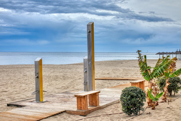 Shower on the beach to clean the sand and salt after bathing