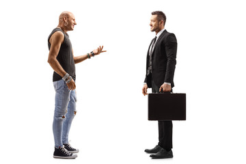 Bald hipster man talking to a businessman