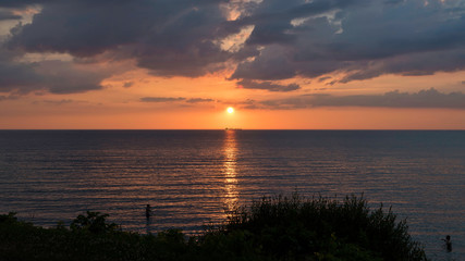 Dramatic sunset over water