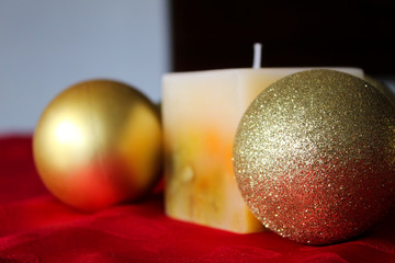 christmas balls and candle