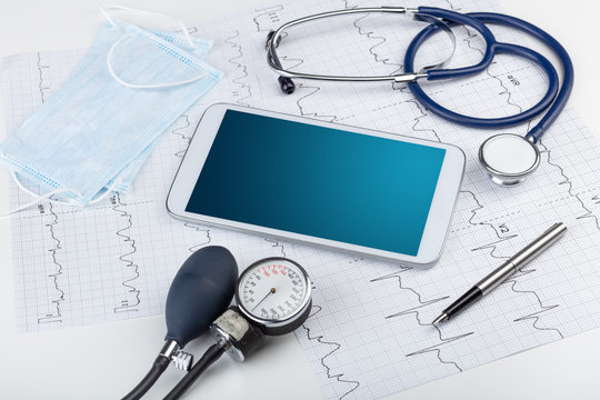 Medicine and modern technology concept with diagnostics concept with free space on tablet screen