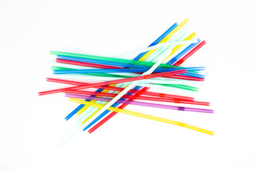 multi-colored tubules for drinks on a white background isolate