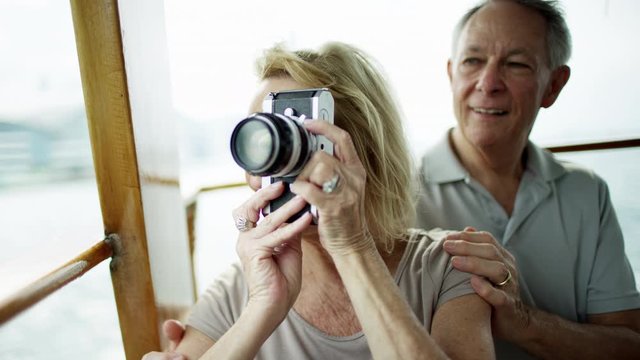 Travel photographs taken by senior retired Caucasian couple 