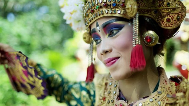 Balinese female a spiritual dancer performing Indonesia Asia