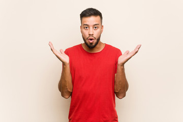 Fototapeta premium Young south-asian man surprised and shocked.