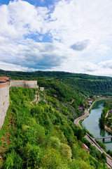 Fototapeta na wymiar Citadel in Besancon and River Doubs of Bourgogne Franche-Comte region of France. French Castle and medieval stone fortress in Burgundy. Fortress architecture and landscape. View from tower