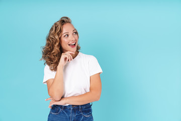 Attractive lovely young girl wearing casual clothing standing