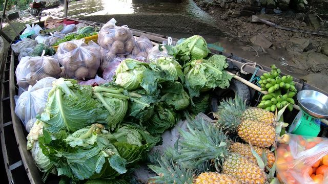 Fresh produce sweet potato cabbage and pineapple Vietnam