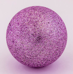 beautivul purple and violet brilliant sphere isolated on a white background , crimson round disco attribute macro