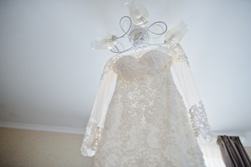 Elegant white wedding dress at bride morning.