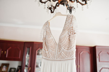 Elegant white wedding dress at bride morning.