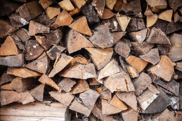 Firewood for the furnace. The woods are stacked.