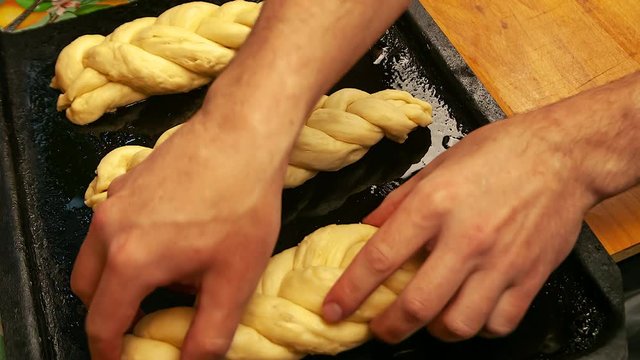 cooking challah or any baking . put the Hala on a baking sheet . 4k