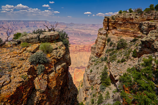 Grand Canyon view between two cliffs with a rock window on the right, located just west of Pinal Point on the south rim, Grand Canyon National Park, Arizona