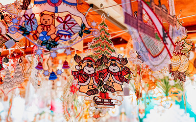 Christmas decorations at Market at Town Hall in Winter Berlin, Germany. Advent Fair and Stalls with Crafts Items on the Bazaar. Europe. German street Xmas and holiday fair in European city. Decoration