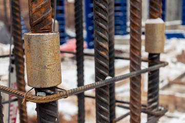 The method of connecting reinforcing bars for concrete work at a construction site.