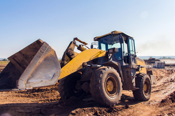 Front-end loader for road works. Special equipment