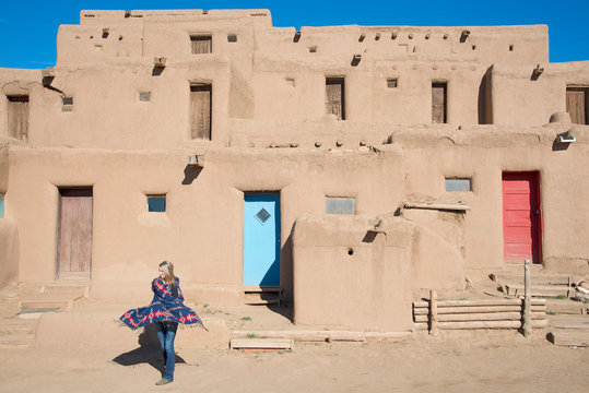Woman visitor at Taos Pueblo, Taos, New Mexico