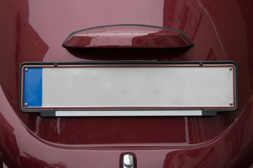 Naklejka premium Vintage Car Behind Empty Mockup Advertising Space Public Transportation Vehicle Close Up License Plate