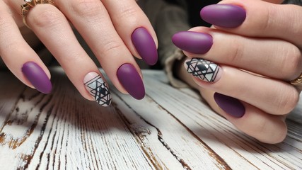 Trendy manicure design on a beautiful background.