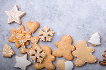 Christmas flat lay background with traditional gingerbread cookies. Festive flat lay X-mas or New year backgrund