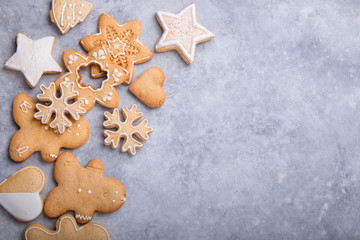 Christmas flat lay background with traditional gingerbread cookies. Festive flat lay X-mas or New year backgrund
