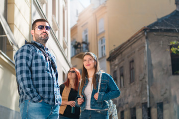 Group of tourists sightseeing the city